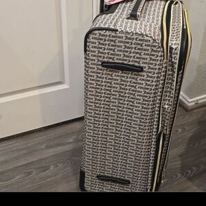 Juicy Couture Black and White Luggage with Gold Accents 30x19x12 Weight 10lbs